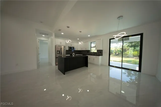 $370,000 | 1004 Grant Boulevard, Lehigh Acres, FL 33974