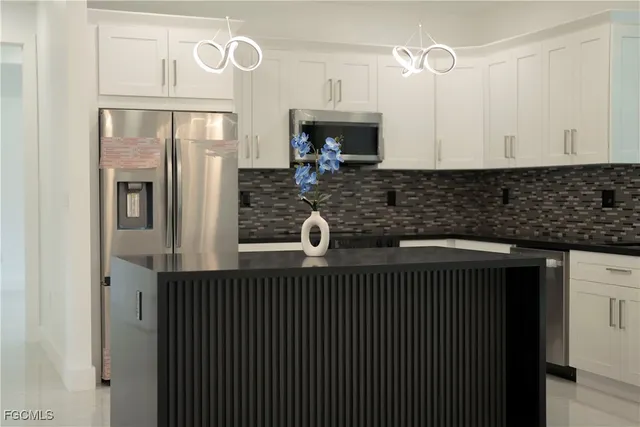 $370,000 | 1004 Grant Boulevard, Lehigh Acres, FL 33974