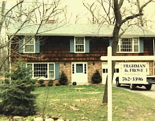 65 Buckboard Road Wilton, CT 06897 - Photo 1 of 1 a view of a house with a yard