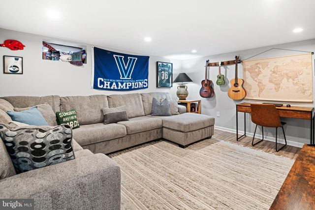 a living room with furniture and a couch
