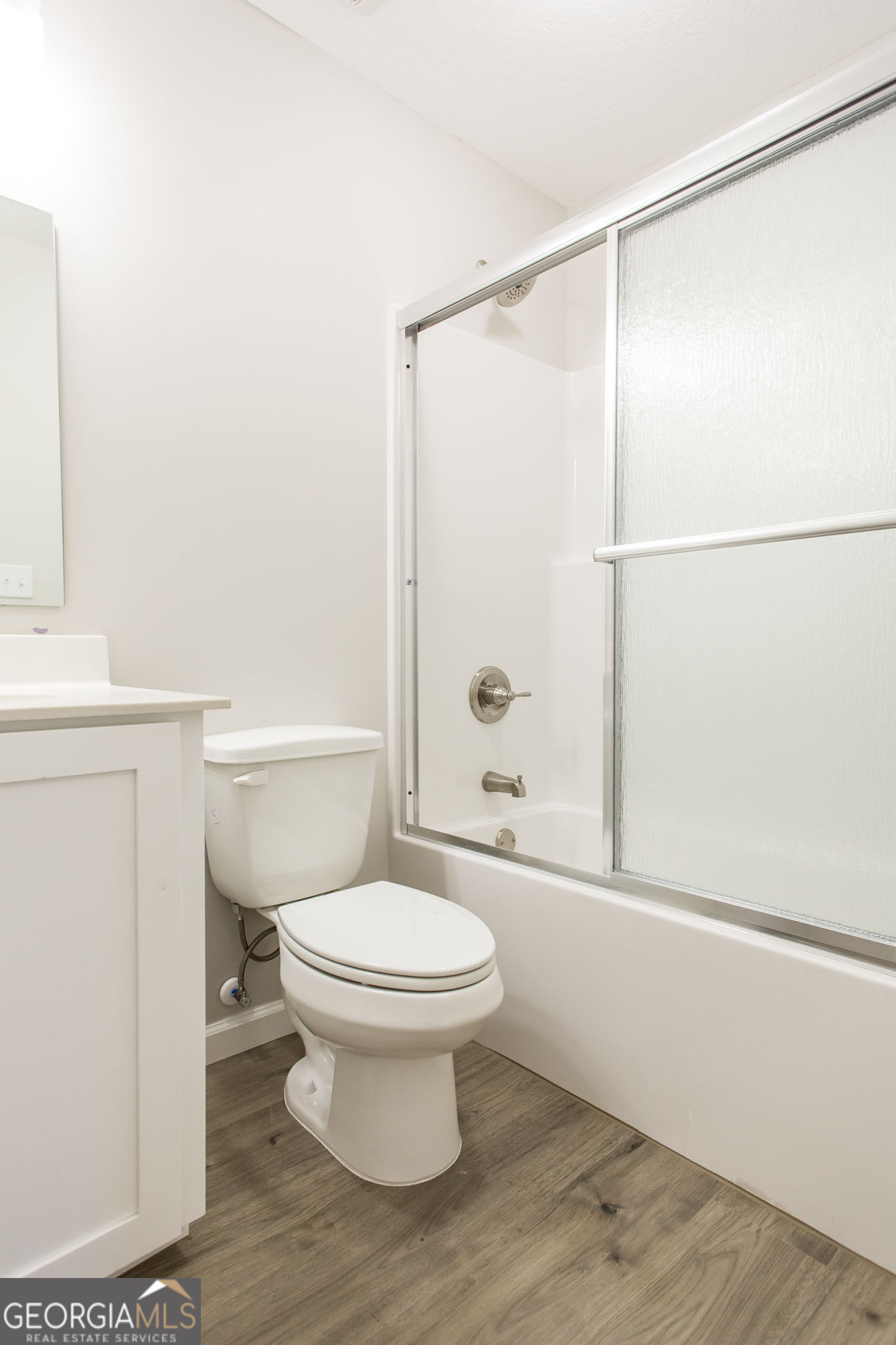 2350 Edgewood Street Waycross, GA 31501 - Photo 15 of 27 a bathroom with a toilet and a shower
