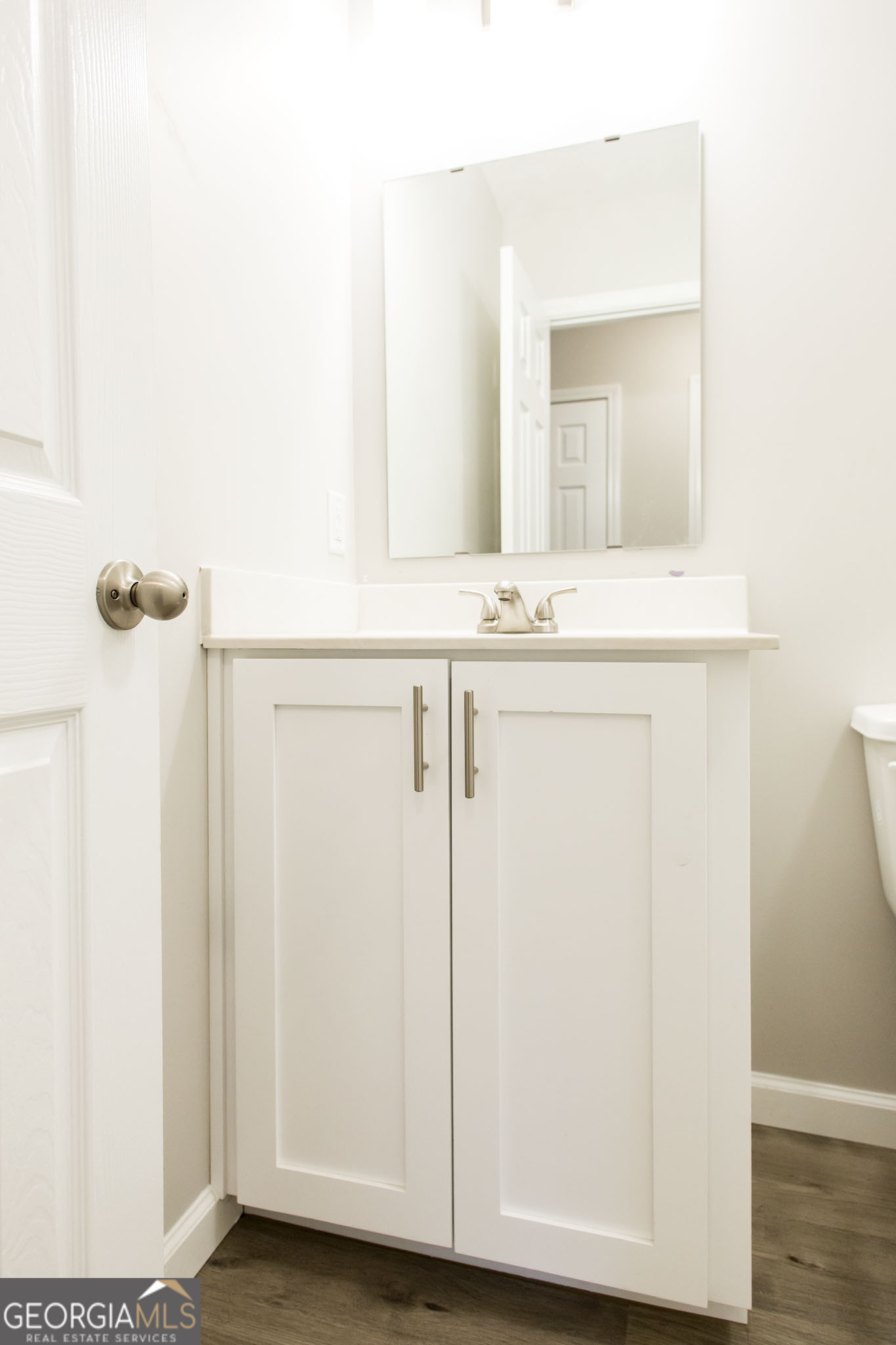 2350 Edgewood Street Waycross, GA 31501 - Photo 16 of 27 a bathroom with a sink and a mirror
