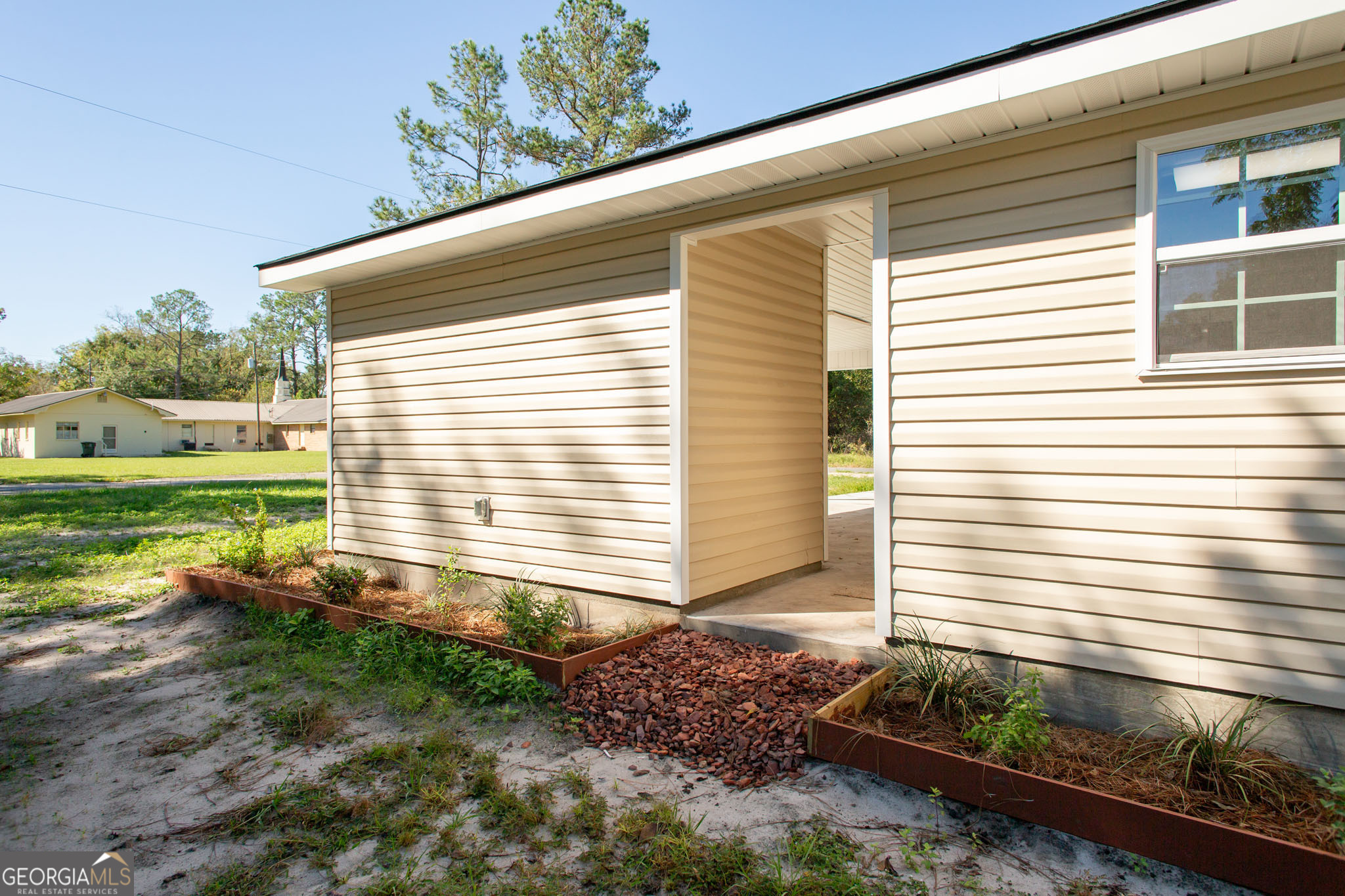 2350 Edgewood Street Waycross, GA 31501 - Photo 26 of 27 a front view of a house with a yard