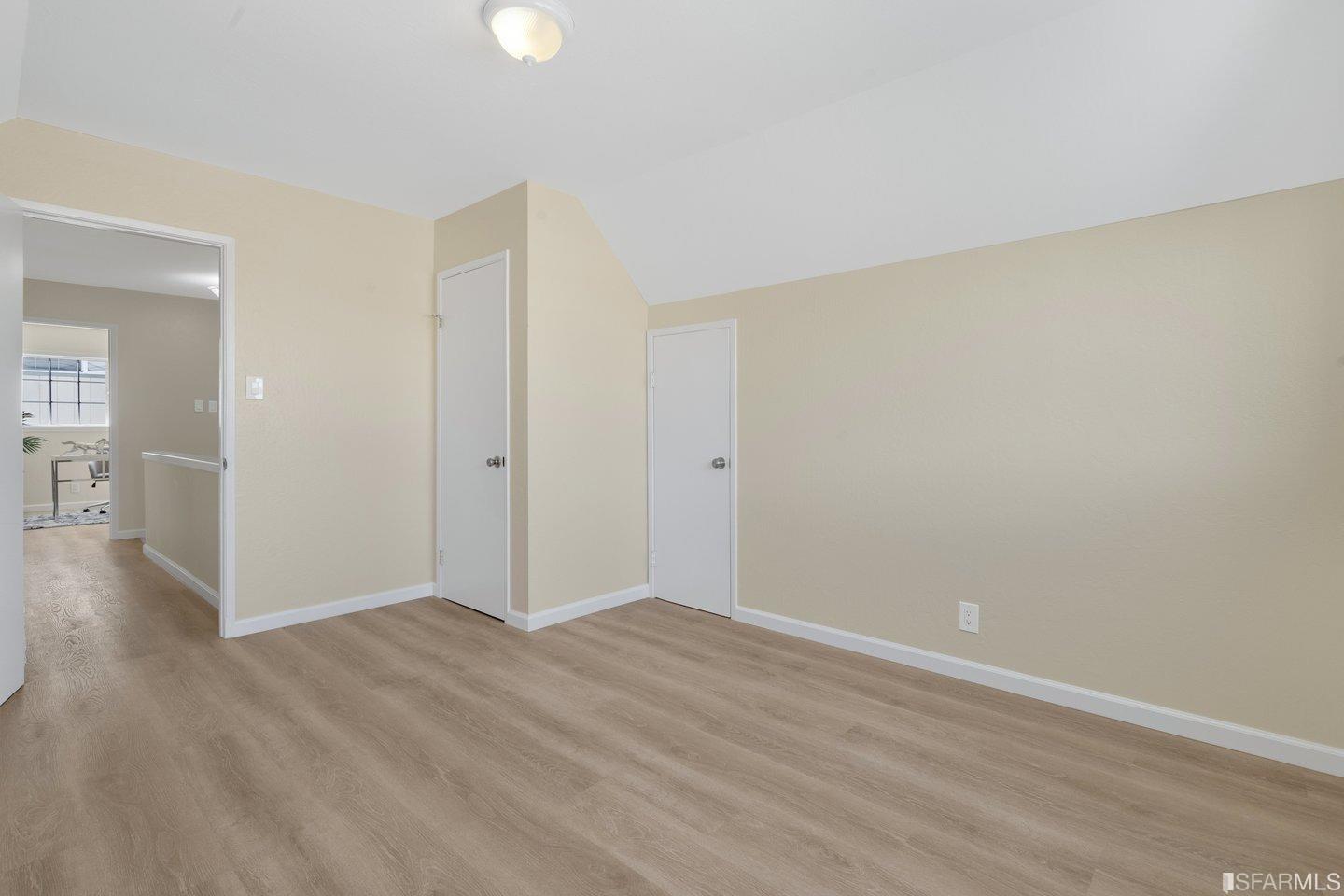 484 Lomond Drive Pacifica, CA 94044 - Photo 17 of 25 wooden floor in an empty room
