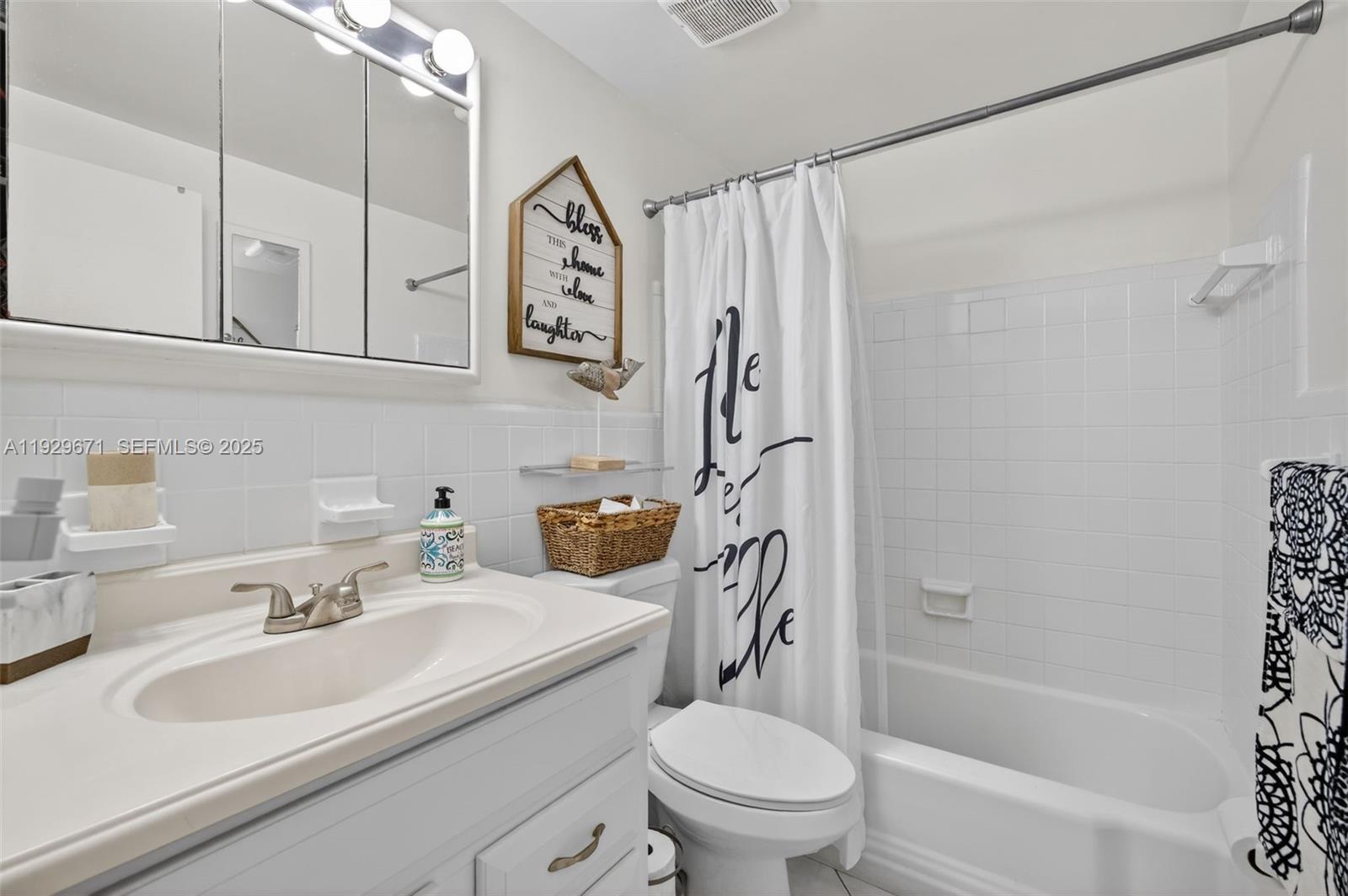 800 Southwest 10th Terrace, Unit 4T Hallandale Beach, FL 33009 - Photo 17 of 39 a bathroom with a sink toilet and shower