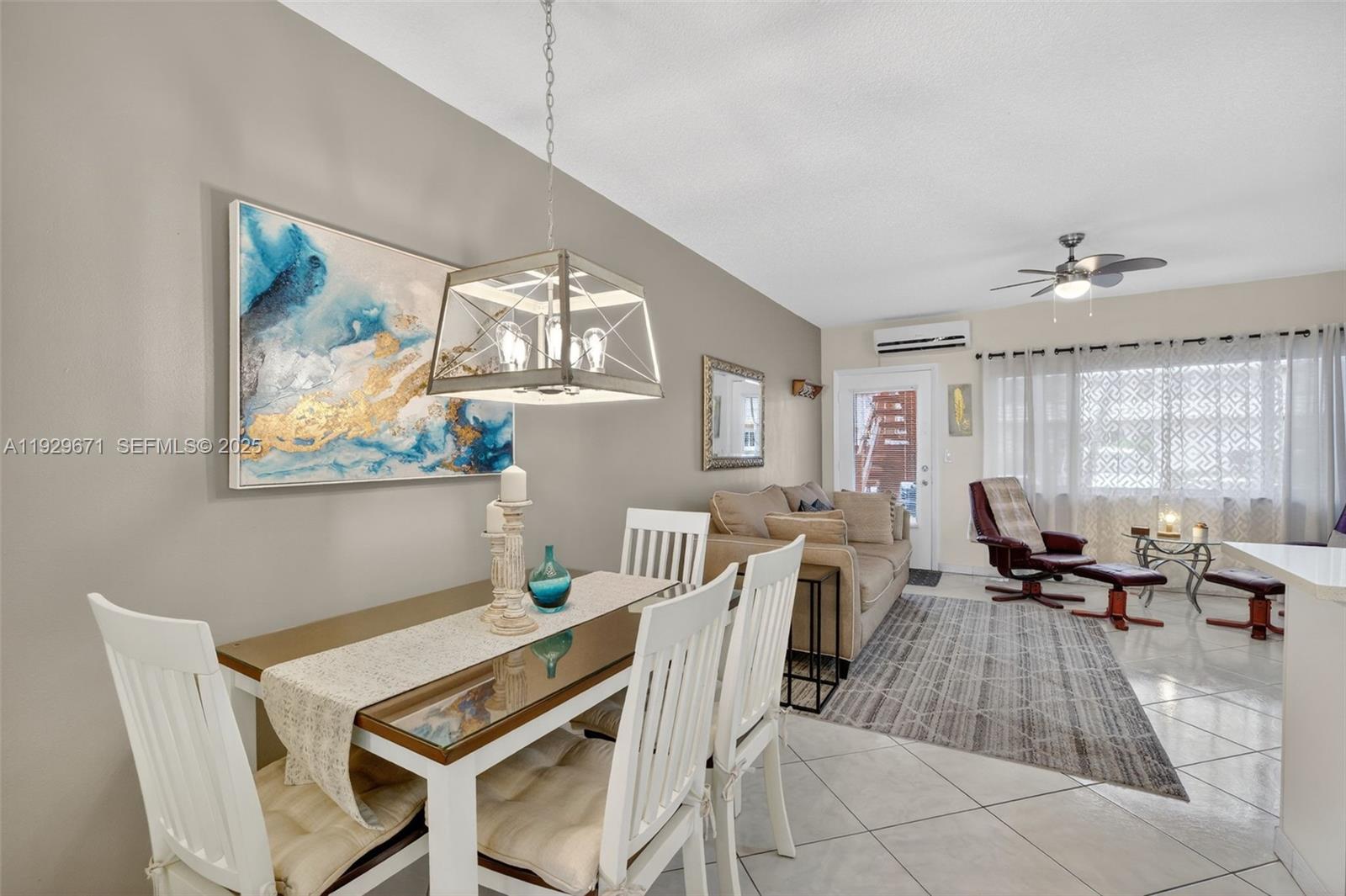 800 Southwest 10th Terrace, Unit 4T Hallandale Beach, FL 33009 - Photo 18 of 39 a view of a dining room with furniture window and outside view