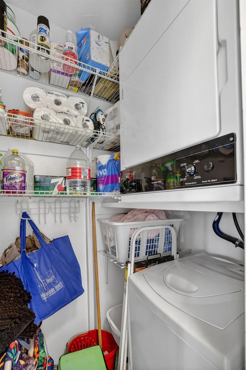 800 Southwest 10th Terrace, Unit 4T Hallandale Beach, FL 33009 - Photo 21 of 39 a utility room with dryer and washer