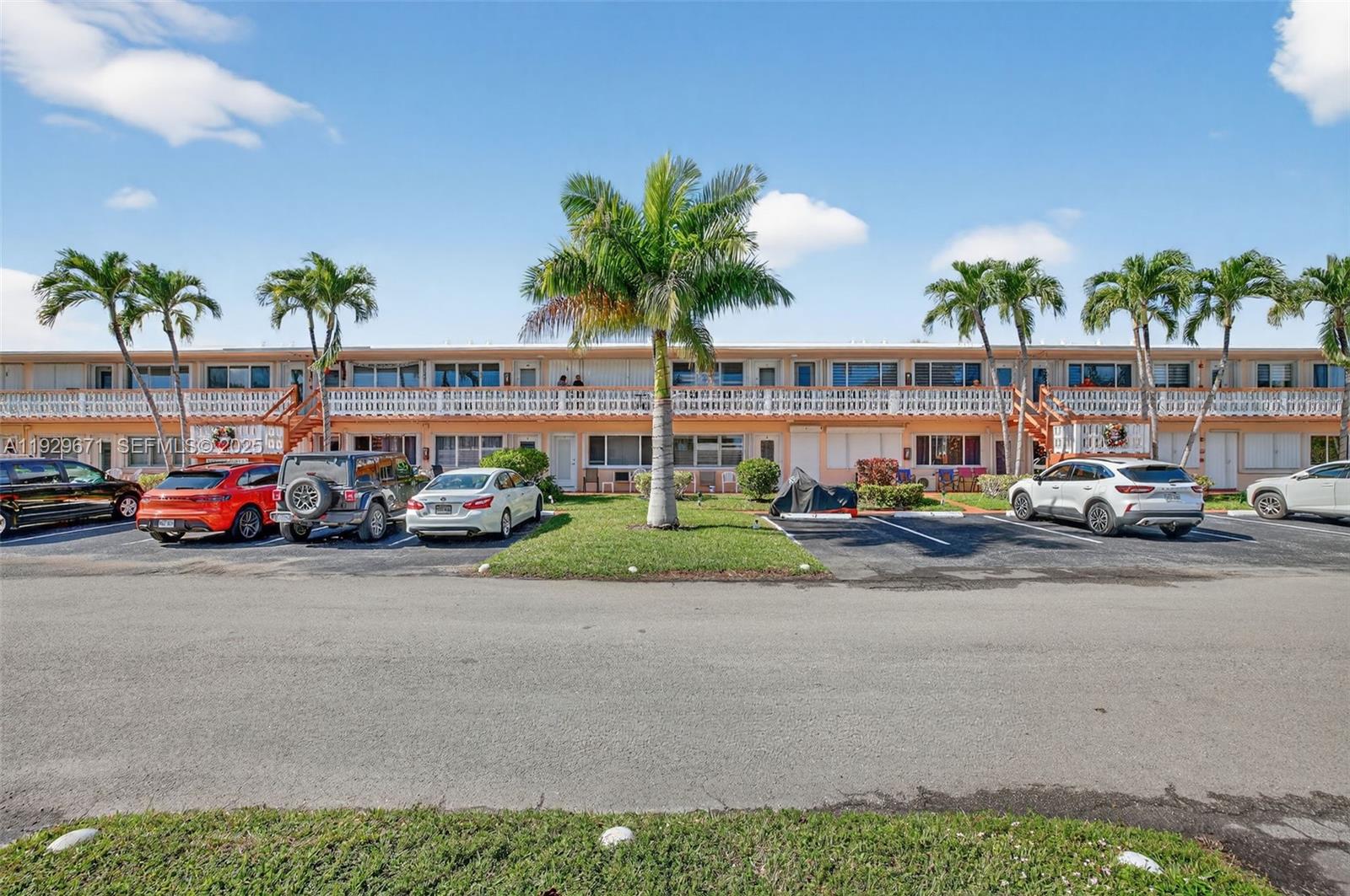 800 Southwest 10th Terrace, Unit 4T Hallandale Beach, FL 33009 - Photo 28 of 39 a view of street with parked cars