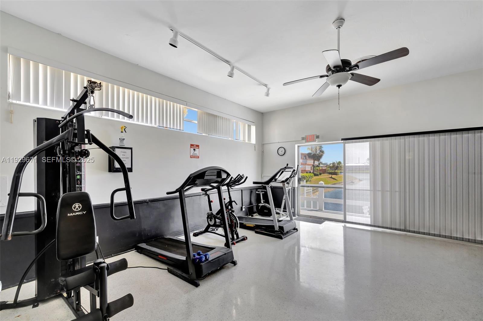 800 Southwest 10th Terrace, Unit 4T Hallandale Beach, FL 33009 - Photo 33 of 39 a view of a room with gym equipment