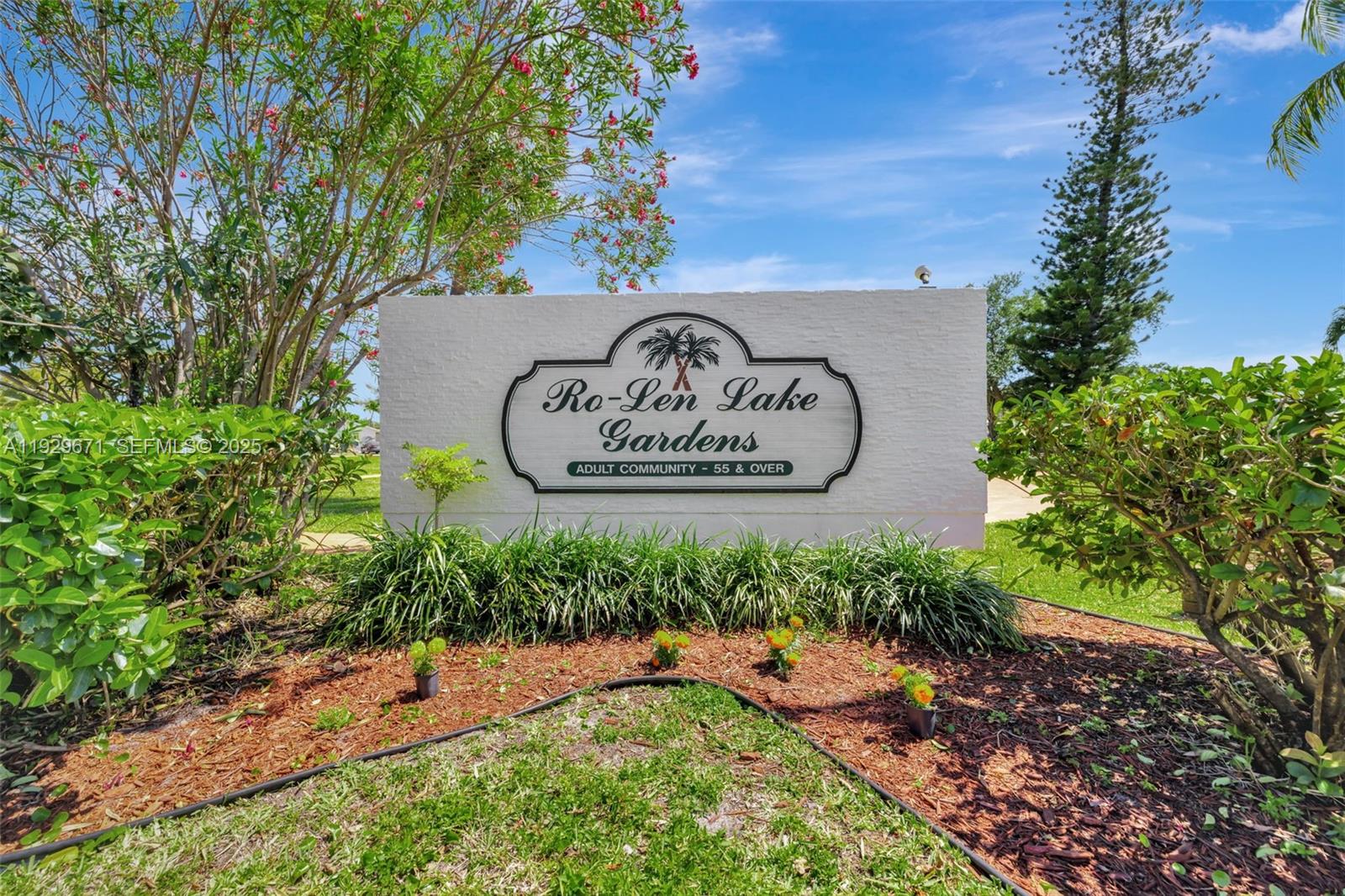 800 Southwest 10th Terrace, Unit 4T Hallandale Beach, FL 33009 - Photo 39 of 39 a view of outdoor space with garden and trees