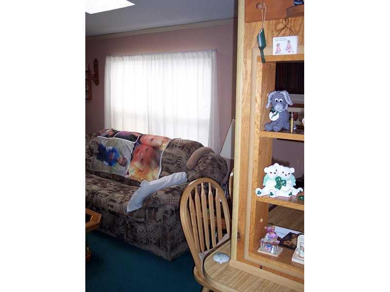 90 Cedar Street Millinocket, ME 04462 - Photo 13 of 32 Living Room.