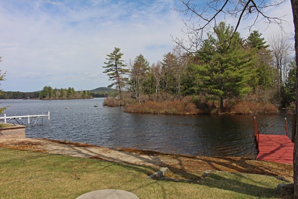 9 Island Road Ashburnham, MA 01430 - Photo 9 of 11 a view of a lake with houses in the back