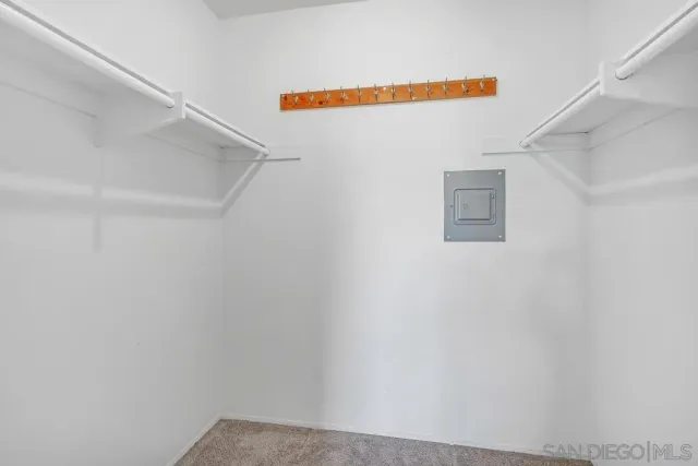 a view of a pathway of a building from a balcony