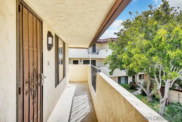 a view of a house with patio outdoor seating