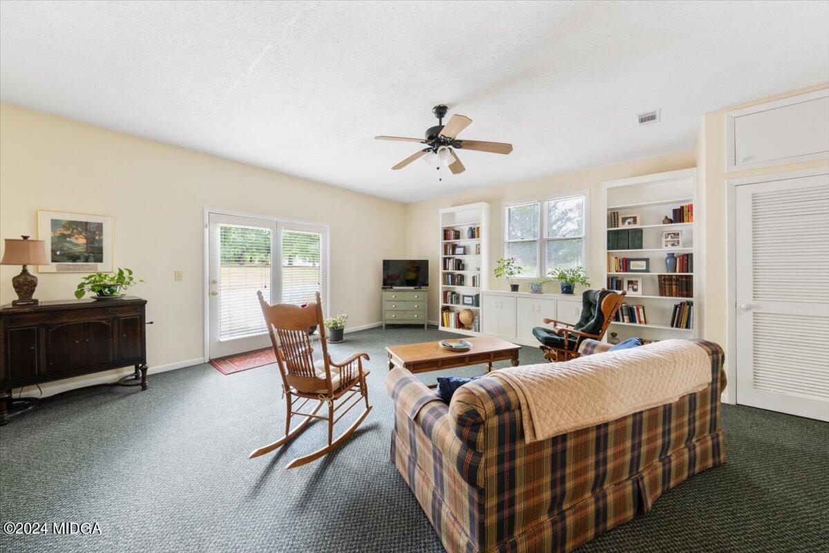 6271 Stapleton Road Macon, GA 31206 - Photo 21 of 41 a bedroom with furniture a bed and a window