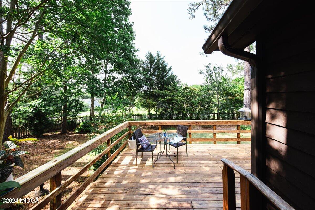 6271 Stapleton Road Macon, GA 31206 - Photo 25 of 41 a view of balcony with wooden floor and outdoor seating