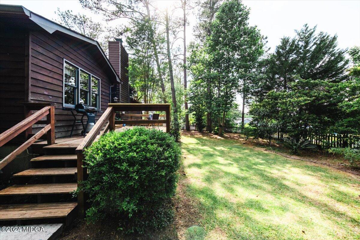 6271 Stapleton Road Macon, GA 31206 - Photo 28 of 41 a backyard of a house with lots of green space