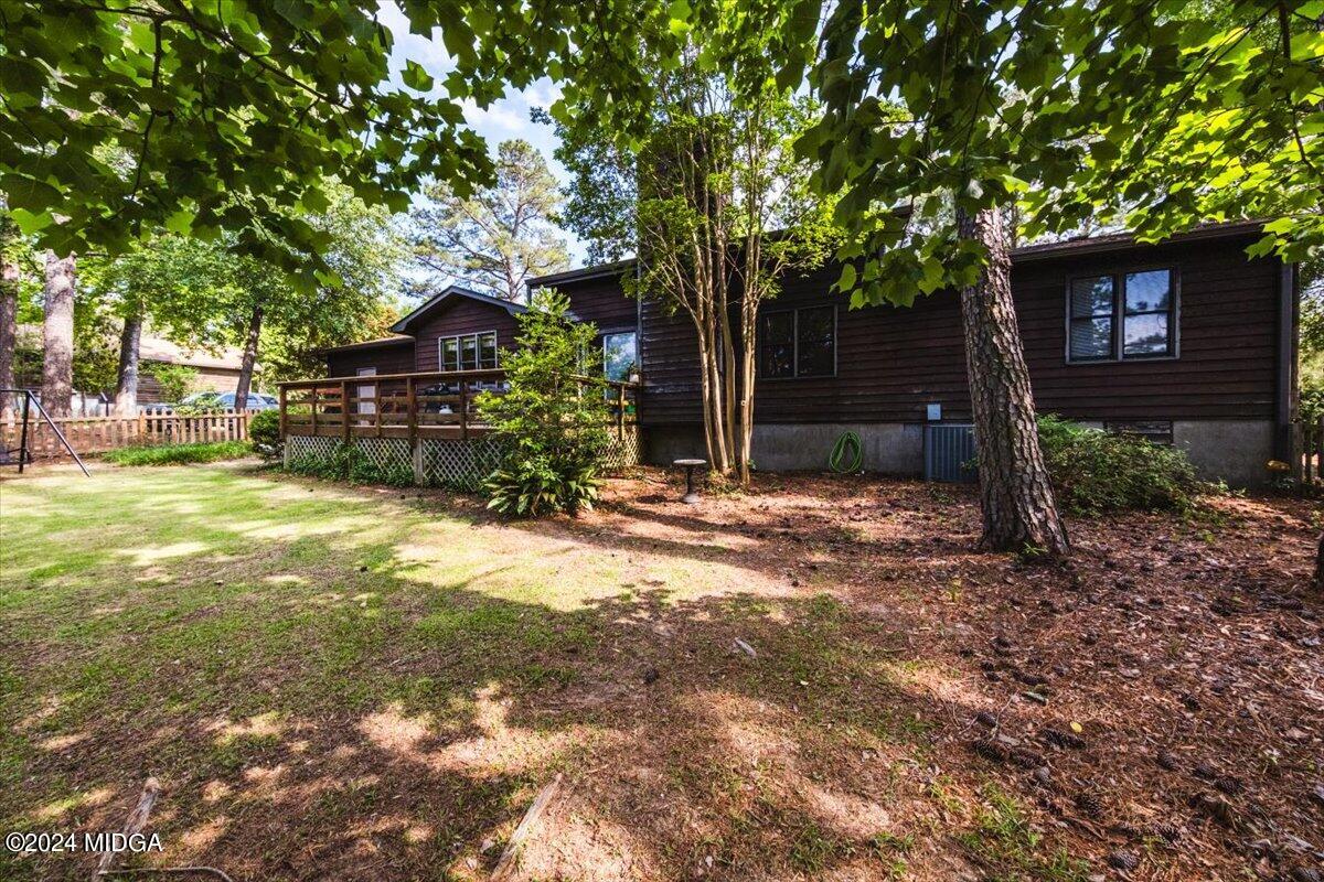 6271 Stapleton Road Macon, GA 31206 - Photo 32 of 41 a backyard of a house with lots of green space