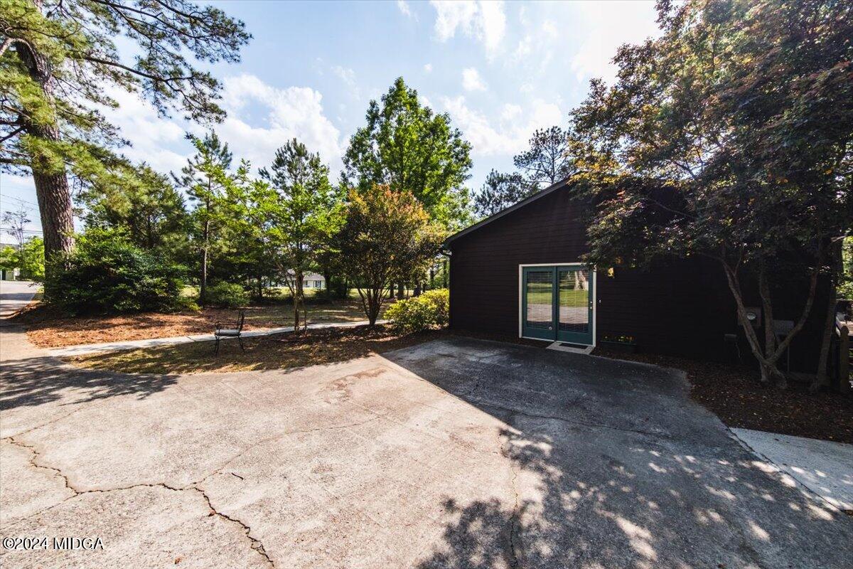 6271 Stapleton Road Macon, GA 31206 - Photo 33 of 41 a view of a house with a yard and garage
