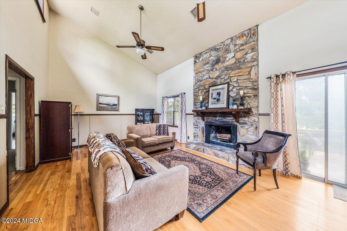 6271 Stapleton Road Macon, GA 31206 - Photo 4 of 41 a living room with furniture and a fireplace