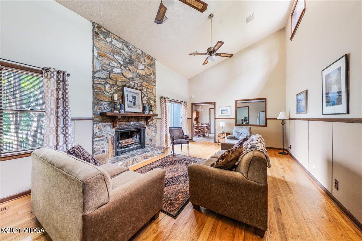 6271 Stapleton Road Macon, GA 31206 - Photo 5 of 41 a living room with furniture and a fireplace