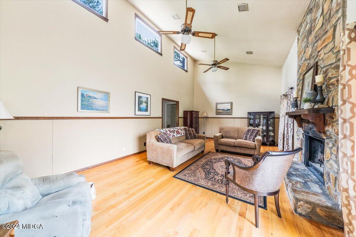 6271 Stapleton Road Macon, GA 31206 - Photo 6 of 41 a living room with fireplace furniture and a rug