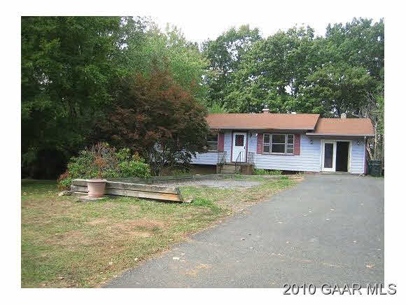 72 Warmar Road Ruckersville, VA 22968 - Photo 1 of 5 a view of an house with swimming pool and sitting area