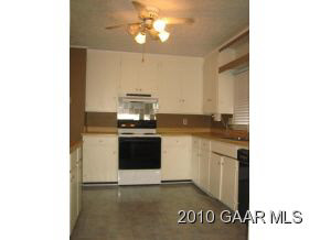 72 Warmar Road Ruckersville, VA 22968 - Photo 4 of 5 a kitchen with granite countertop a sink cabinets and stainless steel appliances