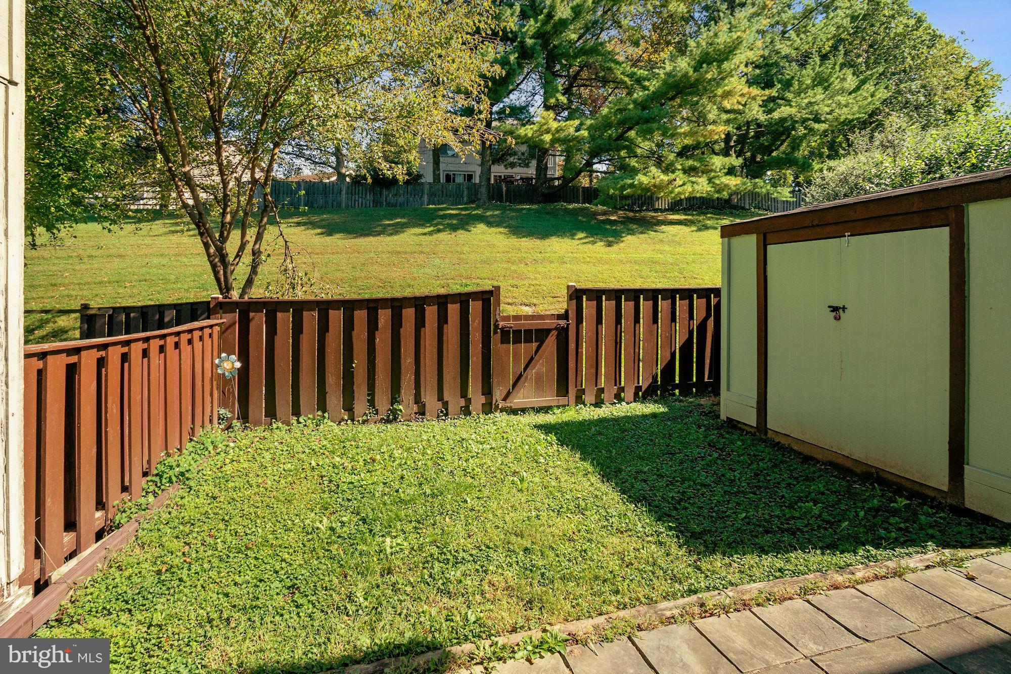 9122 Centerway Road Gaithersburg, MD 20879 - Photo 31 of 33 a view of a backyard with pathway