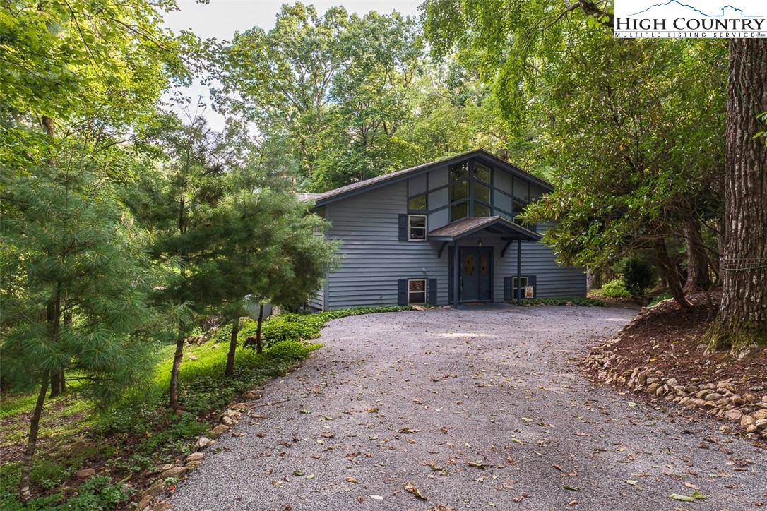 377 Deer Run Road Glade Valley, NC 28627 - Photo 2 of 26 a front view of a house with a yard