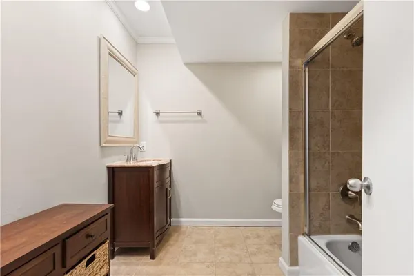 a view of dresser and mirror