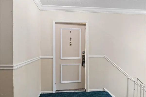 a view of entryway with wooden floor