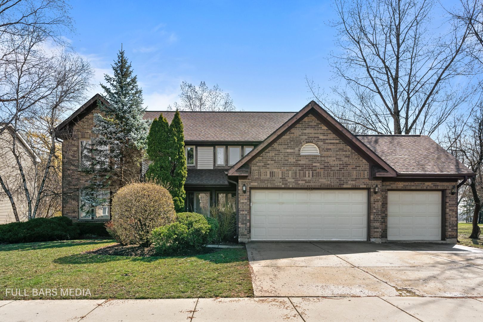 535 Denoyer Trail Wheeling, IL 60090 - Photo 1 of 45 a front view of a house with garden