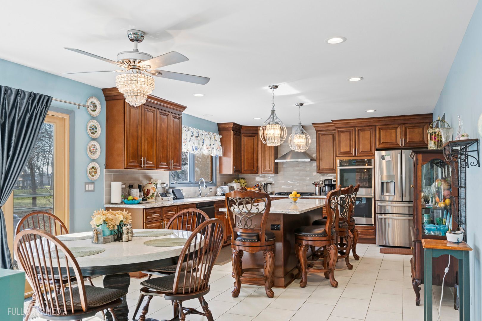 535 Denoyer Trail Wheeling, IL 60090 - Photo 13 of 45 a view of a dining room with furniture