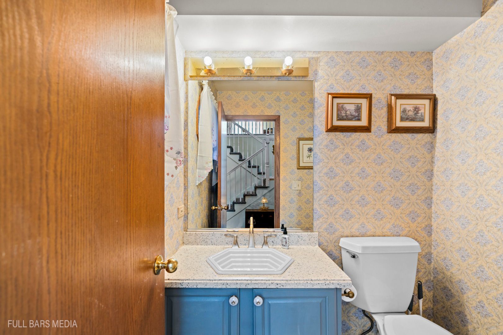 535 Denoyer Trail Wheeling, IL 60090 - Photo 17 of 45 a bathroom with a sink and a mirror