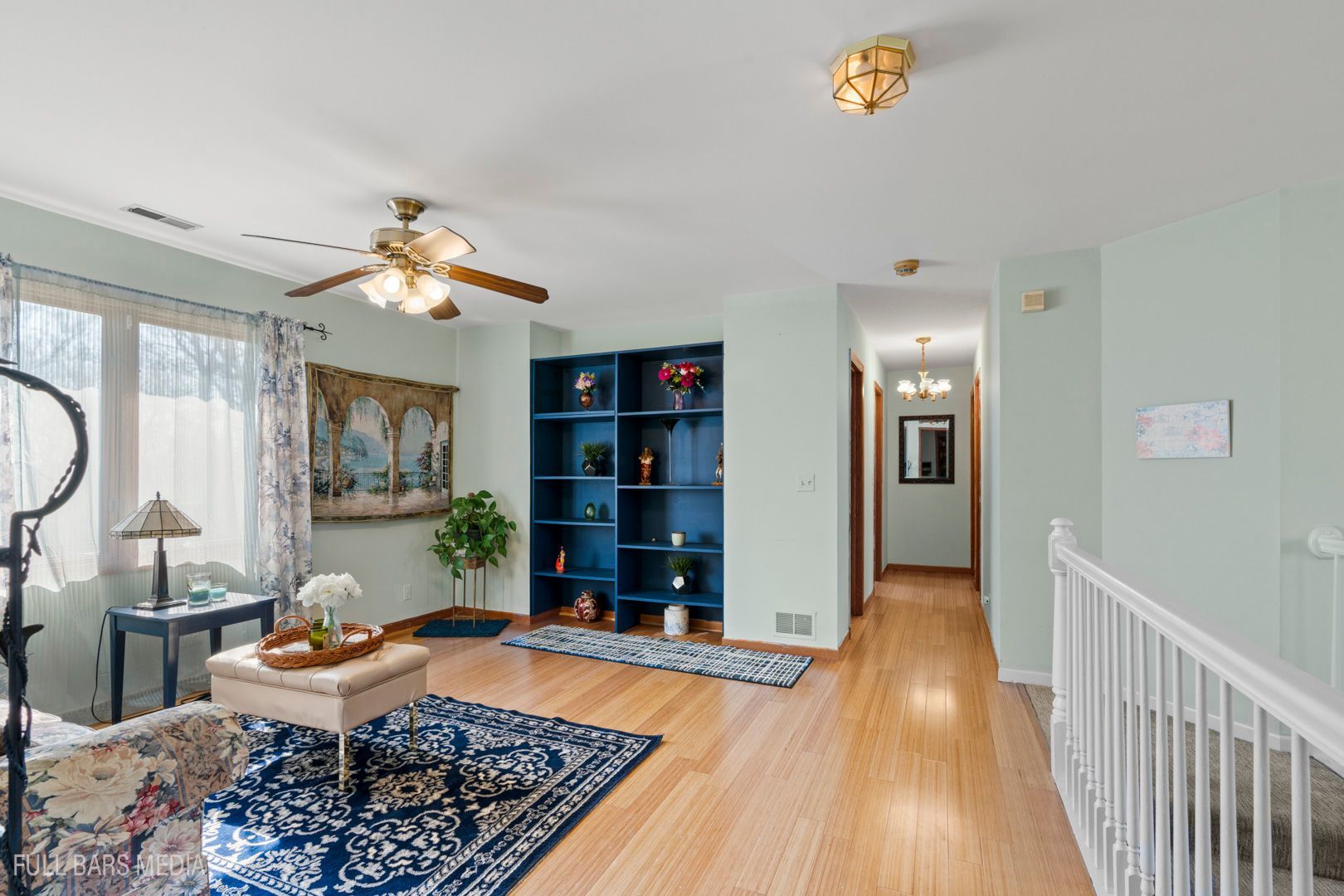 535 Denoyer Trail Wheeling, IL 60090 - Photo 19 of 45 a living room with furniture and wooden floor
