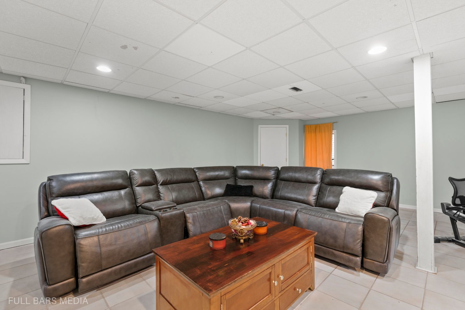 535 Denoyer Trail Wheeling, IL 60090 - Photo 32 of 45 a living room with furniture a rug and a couch