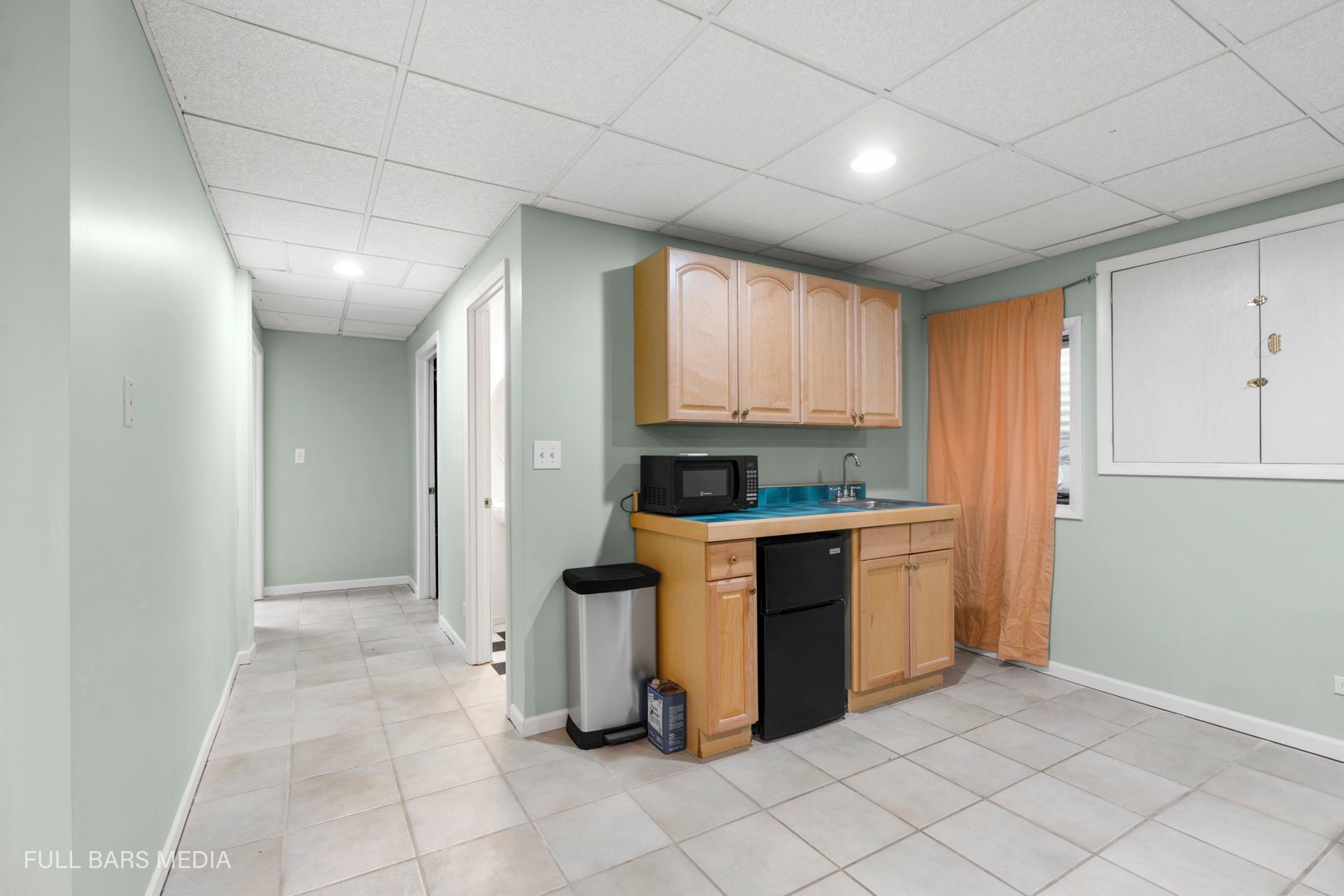 535 Denoyer Trail Wheeling, IL 60090 - Photo 34 of 45 a kitchen with a refrigerator and cabinets