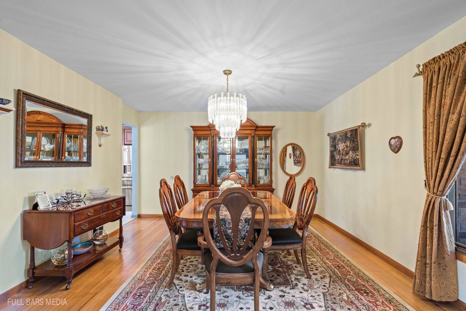 535 Denoyer Trail Wheeling, IL 60090 - Photo 4 of 45 a view of a dining room with furniture window and wooden floor