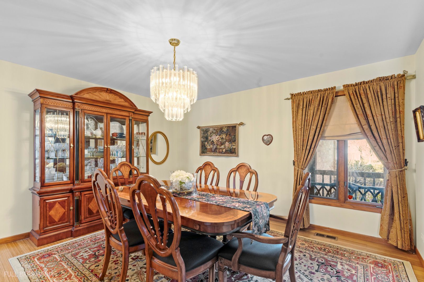 535 Denoyer Trail Wheeling, IL 60090 - Photo 5 of 45 a dining room with furniture a chandelier and wooden floor