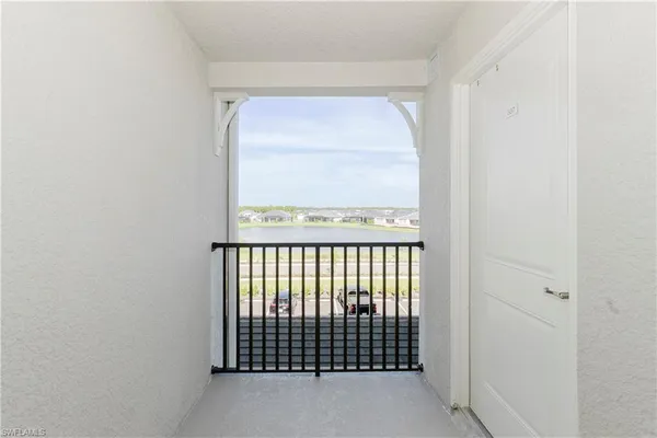 a view of a house with balcony and deck