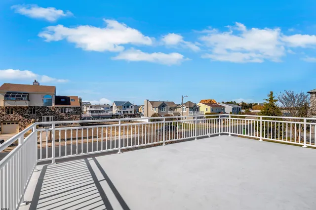 a view of balcony with furniture