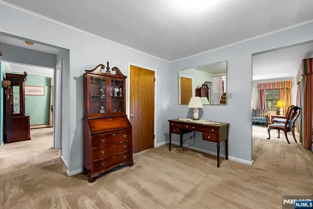 a bedroom with a bed and furniture