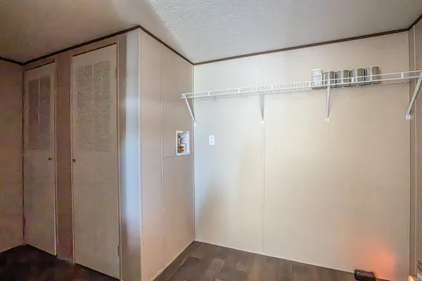 a bathroom with a glass shower door