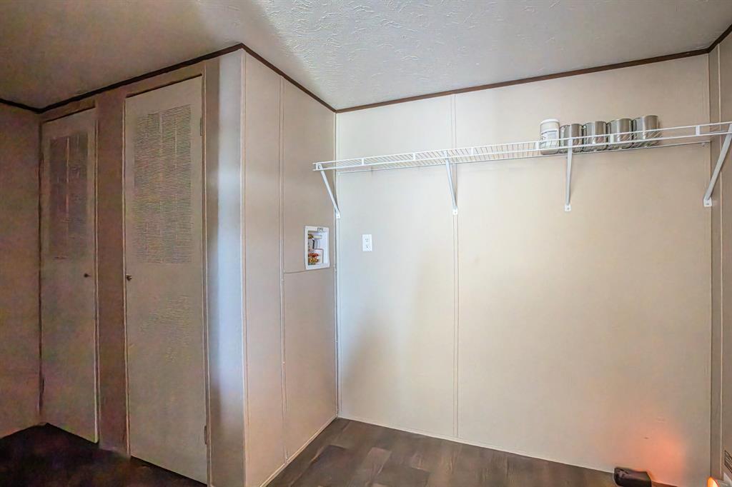 245 Lelon Lane Springtown, TX 76082 - Photo 11 of 37 a bathroom with a glass shower door