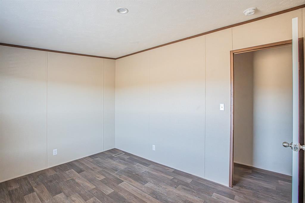 245 Lelon Lane Springtown, TX 76082 - Photo 18 of 37 a view of an empty room