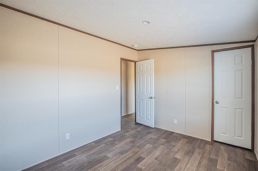 245 Lelon Lane Springtown, TX 76082 - Photo 19 of 37 a view of an empty room