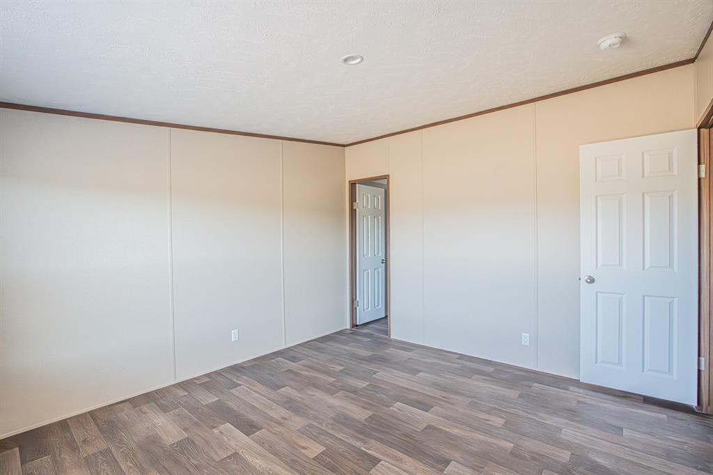 245 Lelon Lane Springtown, TX 76082 - Photo 22 of 37 a view of an empty room