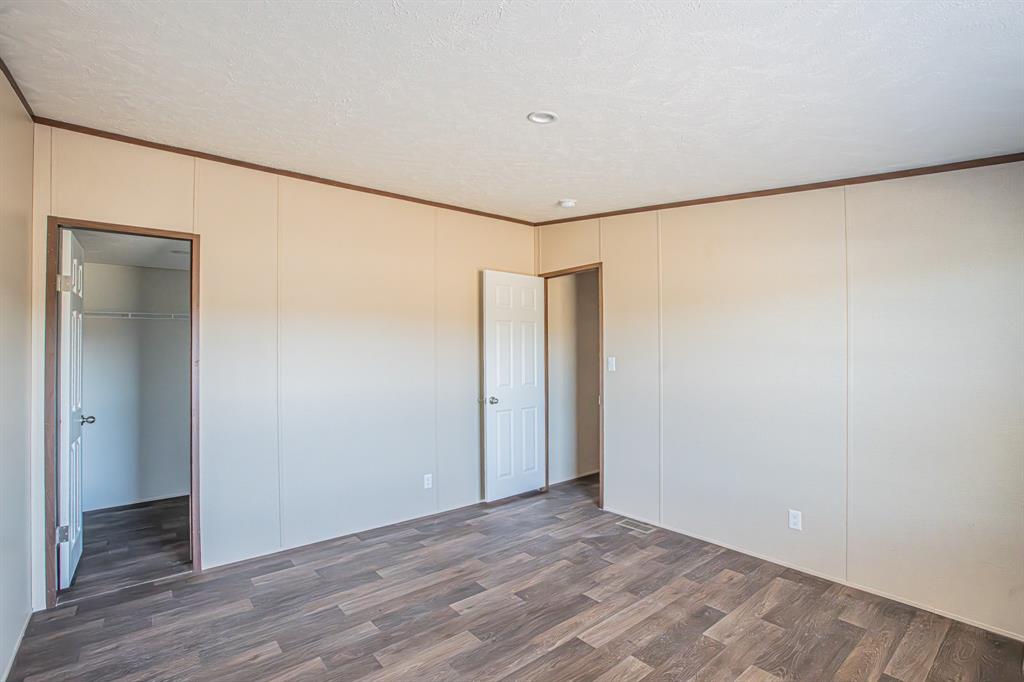 245 Lelon Lane Springtown, TX 76082 - Photo 23 of 37 a view of an empty room