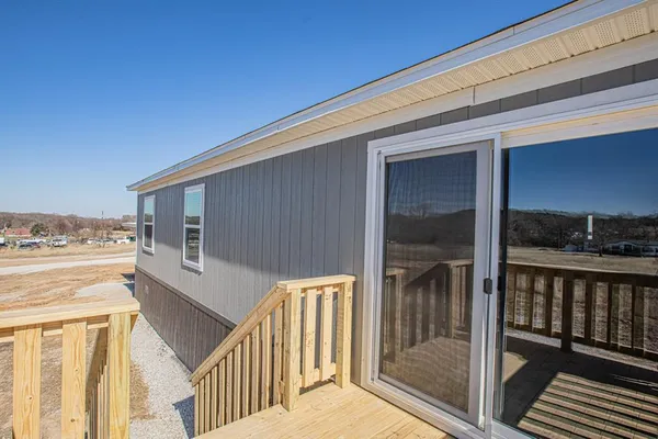 a view of a house with a big yard